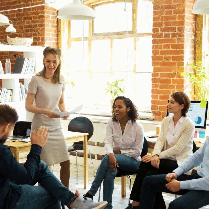 A team of people talking in a meeting.